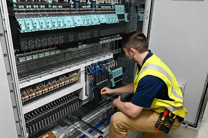 engineer performing ehouse electrical setup